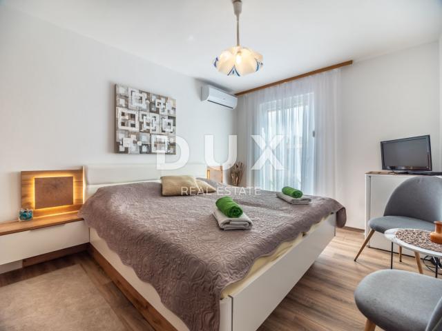 ISTRA, PEROJ - Atraktivna apartmanska kuća s bazenom i pogledom na more!