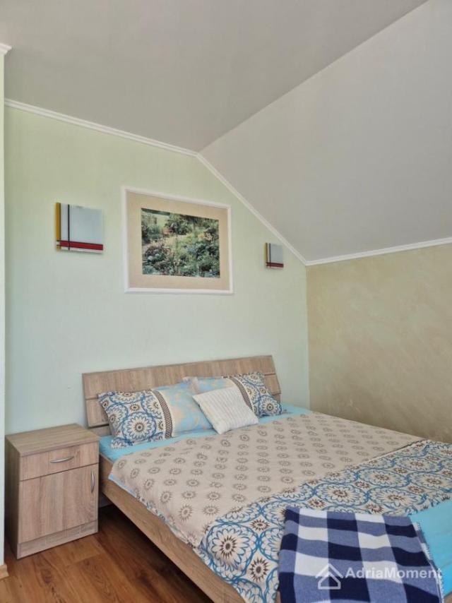 Kuća uz more u Luštici - odmah na plaži
