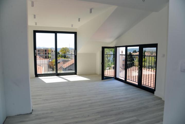 Exclusive 2-bedroom apartment with a sea view in Tivat for sale