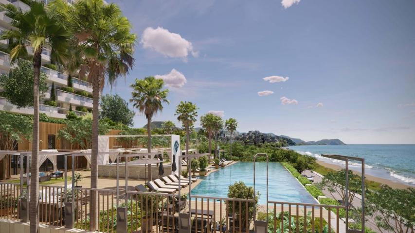 Luxury hotel with 212 residences, 144 rooms, and prime location near beach & city center