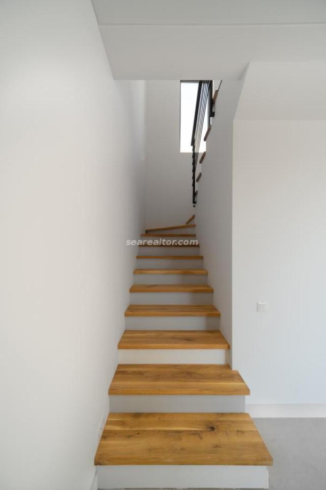 Modern two-story house in Kavač with a yard and parking