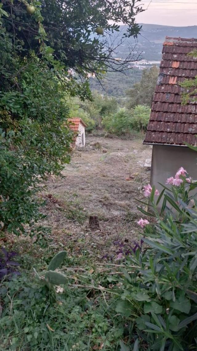 Urbanized Plot of 1700m2 with House Under Construction in Kotor, Kavac, Sea View of Tivat Bay
