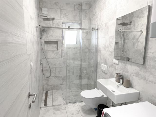 Luxurious two-bedroom apartment of 55m2 with swimming pool in Tivat