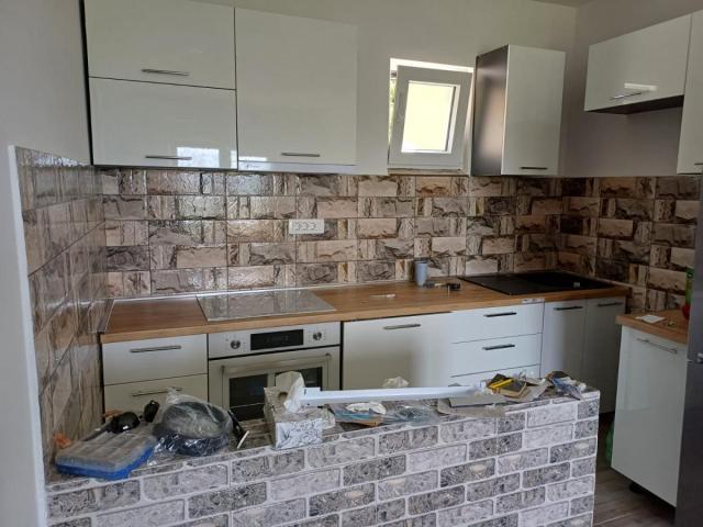 Urbanized Plot of 1700m2 with House Under Construction in Kotor, Kavac, Sea View of Tivat Bay