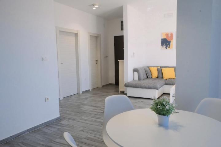 Luxurious two-bedroom apartment of 55m2 with swimming pool in Tivat