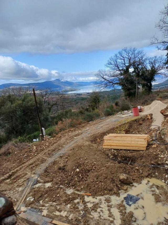 Urbanized Plot of 1700m2 with House Under Construction in Kotor, Kavac, Sea View of Tivat Bay