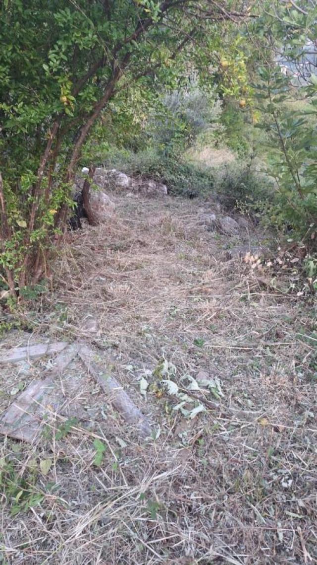 Urbanized Plot of 1700m2 with House Under Construction in Kotor, Kavac, Sea View of Tivat Bay