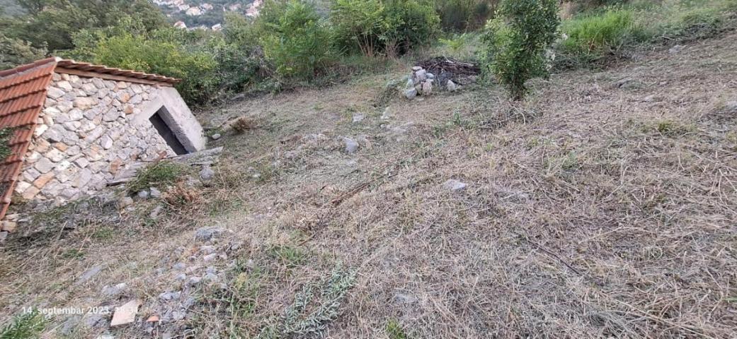 Urbanized Plot of 1700m2 with House Under Construction in Kotor, Kavac, Sea View of Tivat Bay