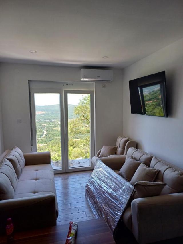 Urbanized Plot of 1700m2 with House Under Construction in Kotor, Kavac, Sea View of Tivat Bay