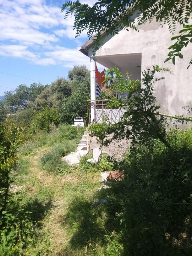 Urbanized Plot of 1700m2 with House Under Construction in Kotor, Kavac, Sea View of Tivat Bay