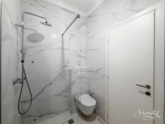 Stan sa 2 spavaće sobe u novom kompleksu u izgradnji u Tivtu