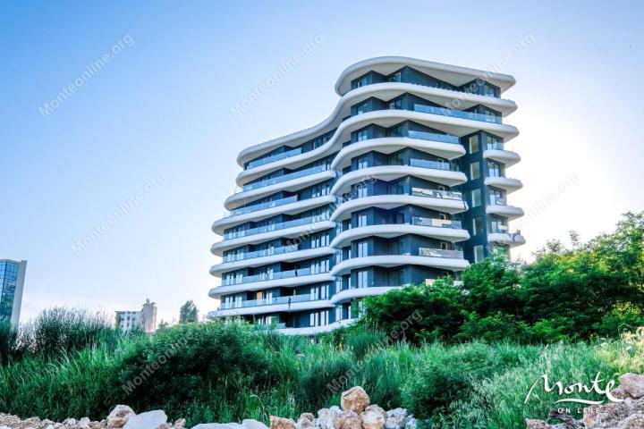 Apartman u premium kompleksu sa panoramskim pogledom na more u Bečićima