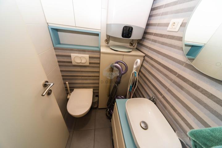 Dvosoban namješten stan 63m2 + garaža, City Kej – Podgorica