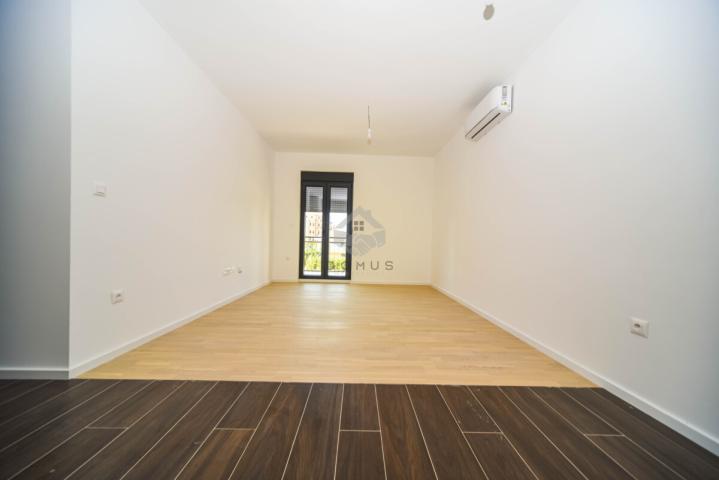 Jednosoban nov stan 45m2 + parking, Tološi - Podgorica