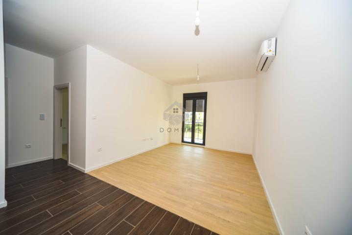Jednosoban nov stan 45m2 + parking, Tološi - Podgorica