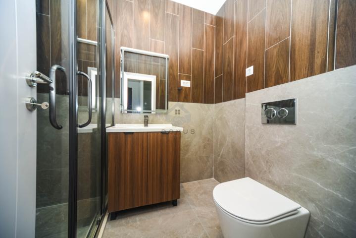 Jednosoban nov stan 45m2 + parking, Tološi - Podgorica