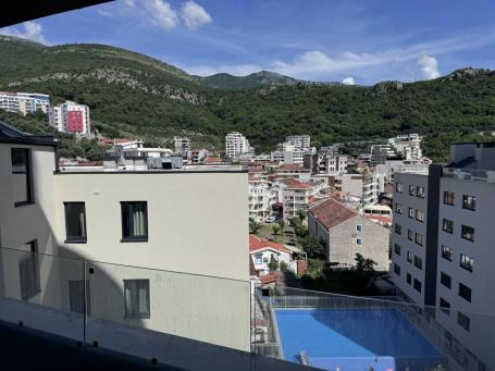 Apartment with 1 bedroom with mountain views on the first line to the sea in Rafailovici