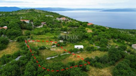 ISTRA, SKITAČA - Jedinstveno građevinsko zemljište s građevinskom dozvolom i pogledom na more 