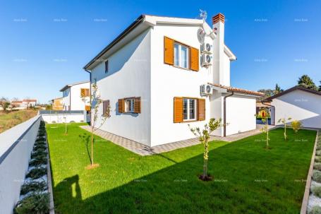 House Near the city of Pula, two new holiday homes with swimming pools.