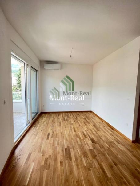 Na prodaju nov, nenamješten stan površine 58 m² u Bečićima