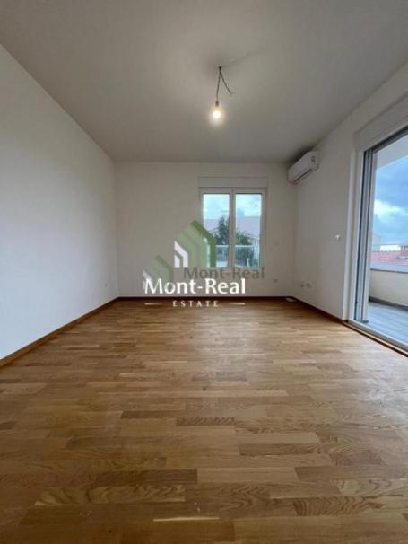 Prodaje se potpuno nov neopremljen dvosoban stan površine 68m2, Becici