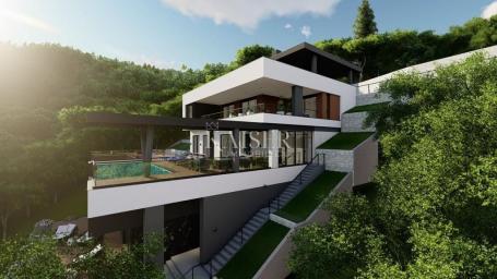 Ičići- građevinsko zemljište 1300m2 s pogledom na more