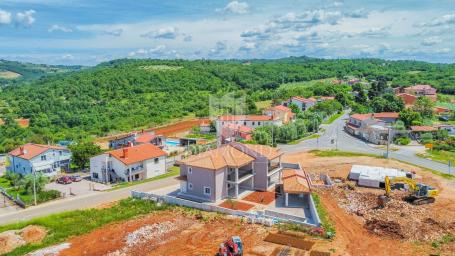 Momjan, okolica! Dvojna kuća sa bazenom u novogradnji!