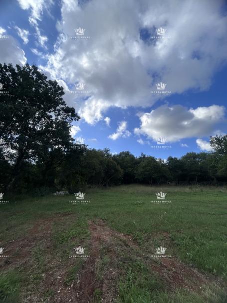 Istra , Baderna , gradjevinska parcela 1190m2 , sva infrastruktura , M-namjena , pogled na more