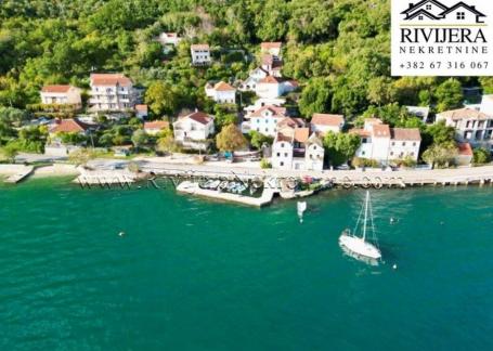 For sale is a charming stone house