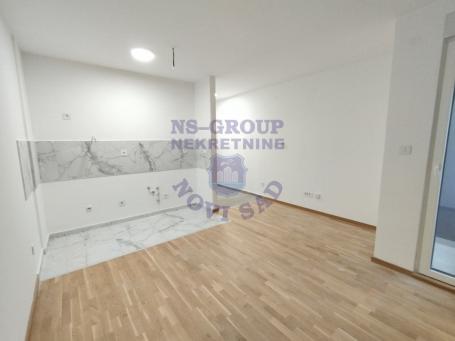 Nova, neuseljavana garsonjera sa terasom smeštena u izuzetnom kompleksu