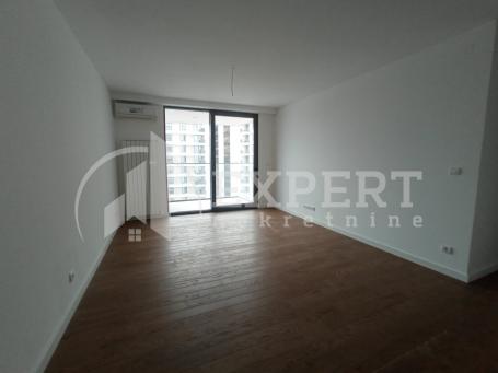 Izdaje se neuseljavan poslovni prostor u novom kompleksu Planet Residence, 76m2