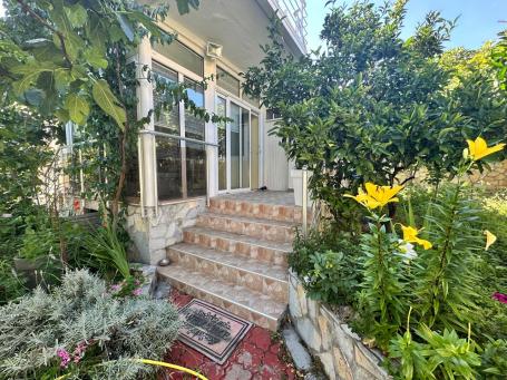 House with three apartments and a garden not far from the sea in Bar. 