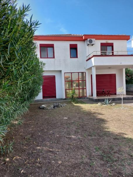 A house of 155 m2 with a land plot of 322 m2 in the suburbs of Ulcinj (Donji Štoj) is offered for sa