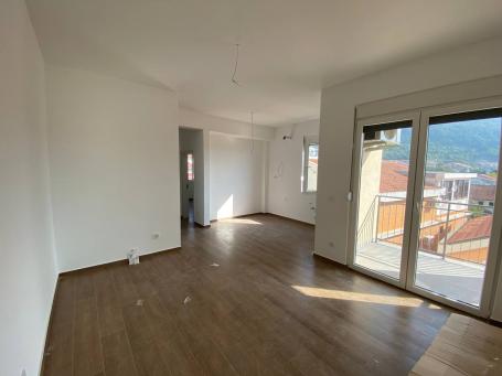 Apartment in Budva in a new building with three bedrooms