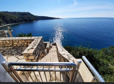 Villa on the first coastline with private beach and pool