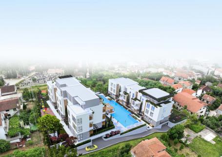 A 1+1 apartment with a private garden in a new complex with a swimming pool in the Bay of Kotor
