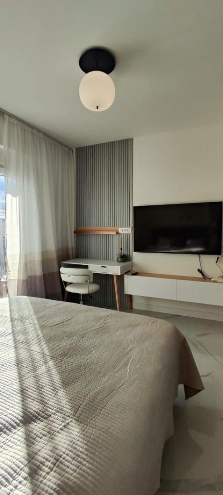 A studio apartment in a new modern residential complex with a swimming pool is for sale. 