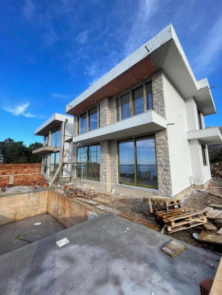 New villa with a pool and sea views in Dobra Voda. 