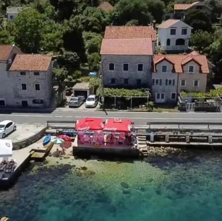 House on the first line of the sea with its own pier