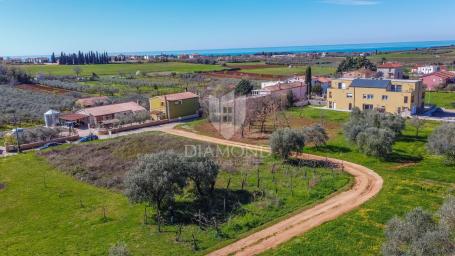 Novigrad, građevinsko zemljište s projektom i dozvolom !