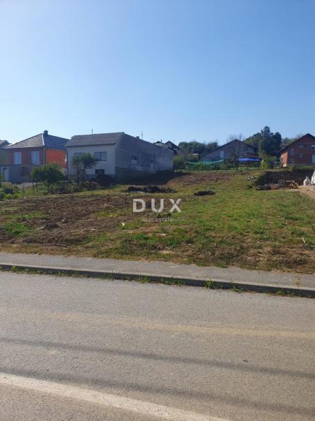 SLAVONIJA, POŽEGA - Građevinska parcela 1245m², odlična lokacija uz cestu