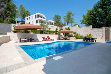 Modern villa with swimming pool and partial sea view, 