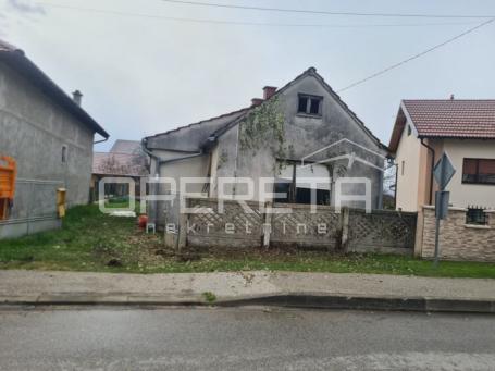 Kuća s okućnicom i dodatnim objektom u mirnom Donjem Kućanu