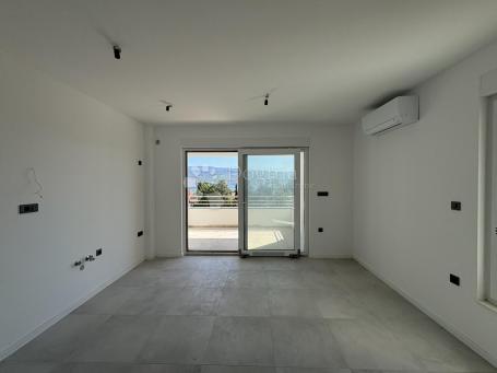 NOVOGRADNJA - APARTMAN U PRIZEMLJU SA OKUĆNICOM
