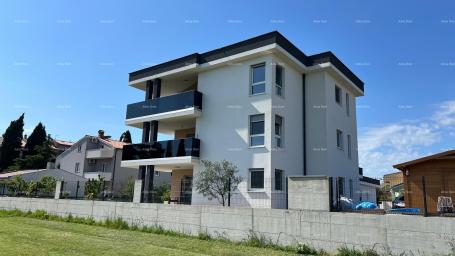 Apartment Modern three-bedroom apartment with a large terrace and 2 parking spaces.