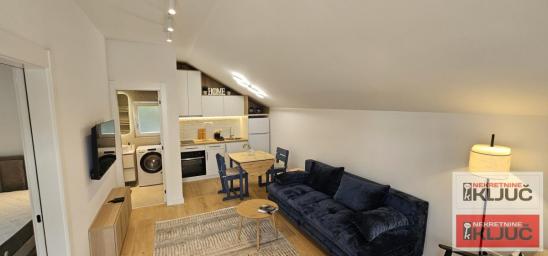 CENTAR IZDAJE SE MODERAN APARTMAN SA PARKING MESTOM