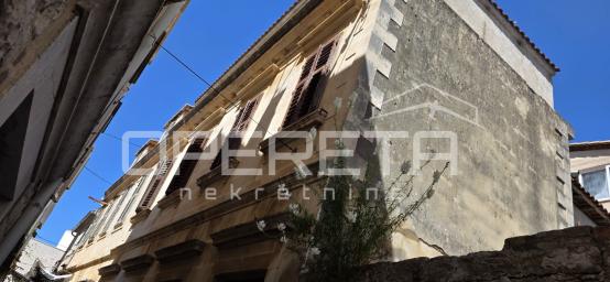 STAMBENO - POSLOVNA ZGRADA S PRAVOMOĆNOM GRAĐEVINSKOM DOZVOLOM ZA REKONSTRUKCIJU