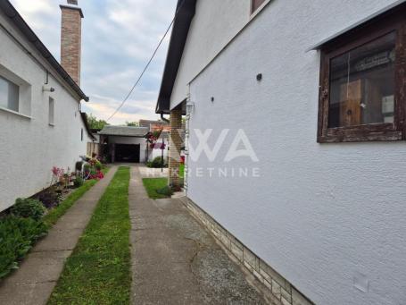 Porodična kuća 113m² + pomoćni stan 60m², plac 9 ari