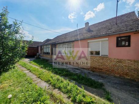 Prigrevica – Očuvana kuća 169m², pomoćni objekti, voćnjak, mogućnost kupovine putem kredita