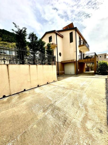 Modern three-story house with sea view in the suburbs of Tivat